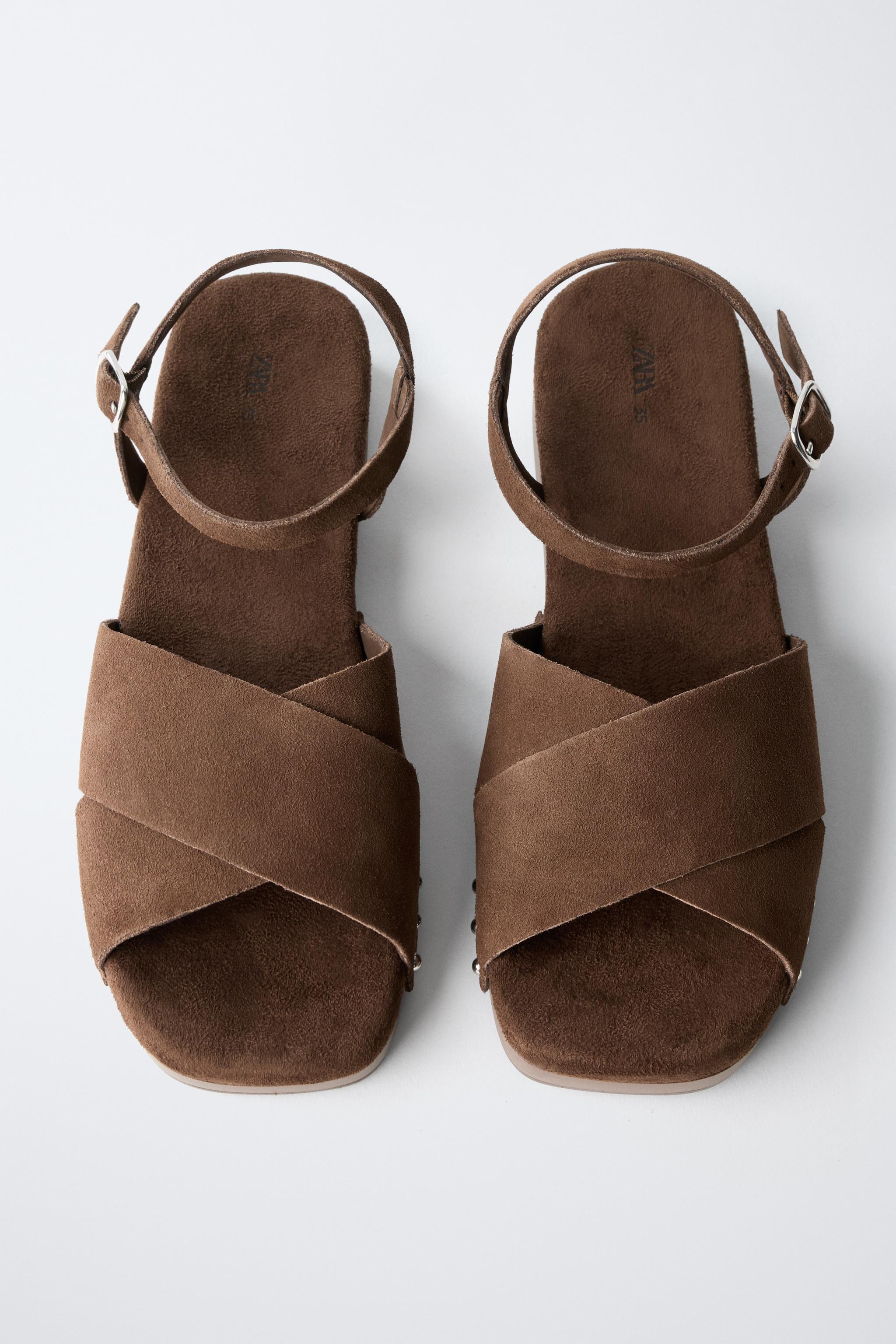 SABOTS EN CUIR À SEMELLES FINES